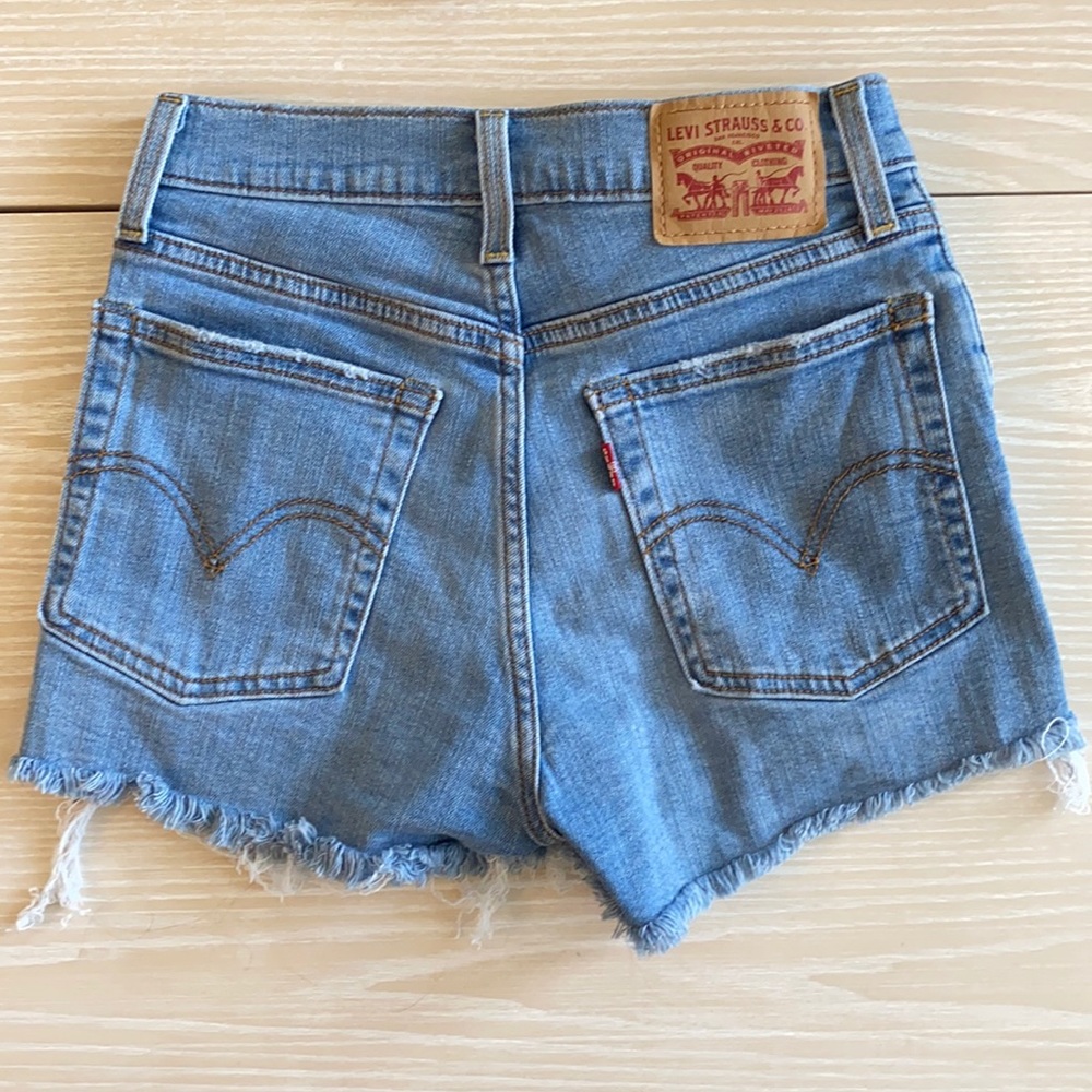 Levi’s High Rise Distressed Denim Shorts